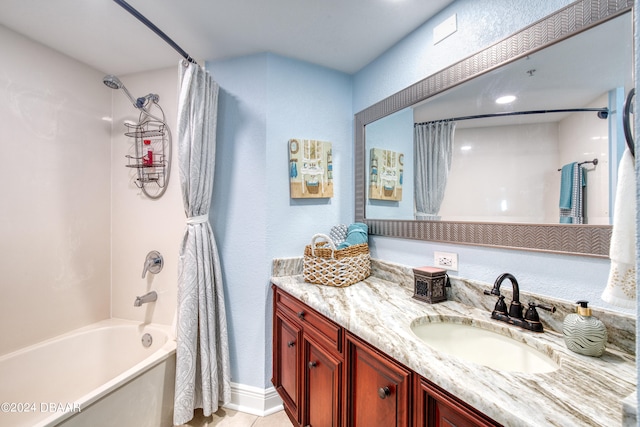 bathroom featuring shower / bath combo, vanity, and tile patterned floors