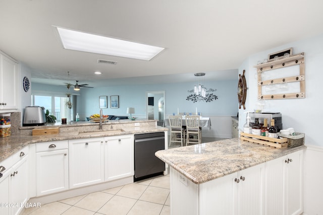 kitchen featuring sink, light stone counters, ceiling fan, white cabinets, and dishwasher