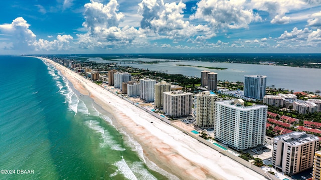 aerial view with a beach view and a water view