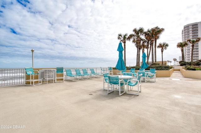 view of patio / terrace with a water view