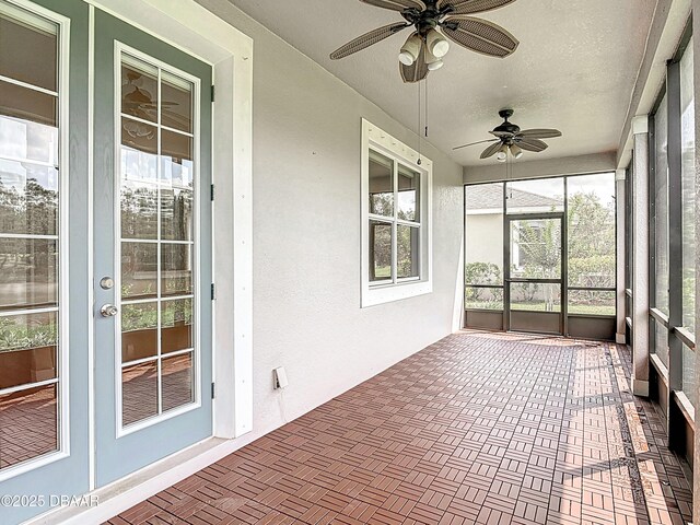 417 Grande Sunningdale Loop, Daytona Beach, FL 32124 - unfurnished sunroom featuring french doors and ceiling fan