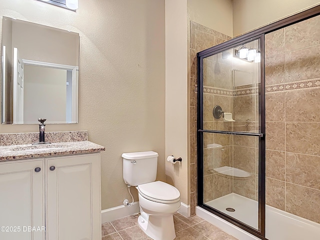 417 Grande Sunningdale Loop, Daytona Beach, FL 32124 - bathroom with toilet, a shower stall, tile patterned flooring, and baseboards