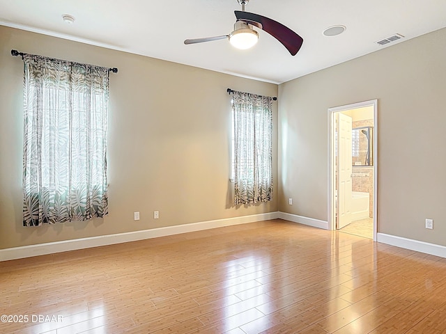 417 Grande Sunningdale Loop, Daytona Beach, FL 32124 - spare room with ceiling fan, light wood-type flooring, baseboards, and a smoke detector