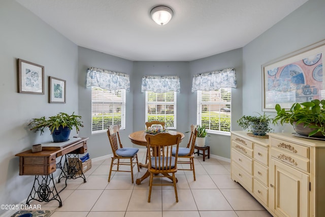 448 White Coral Ln, New Smyrna Beach, FL 32168 - dining room with plenty of natural light and light tile patterned floors