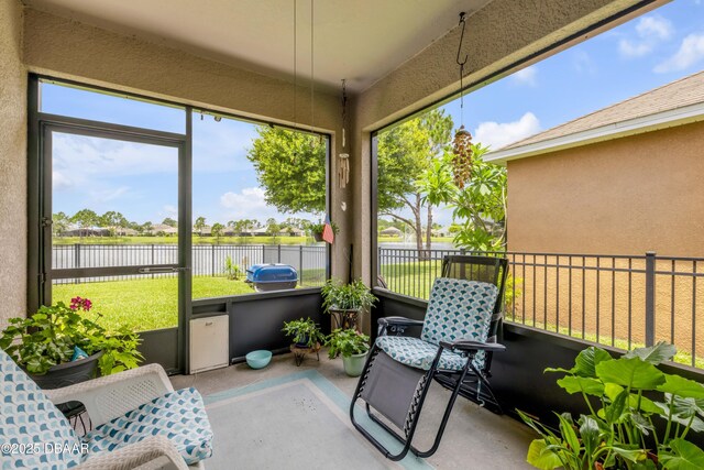 448 White Coral Ln, New Smyrna Beach, FL 32168 - sunroom with a water view and plenty of natural light