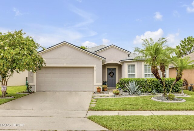 448 White Coral Ln, New Smyrna Beach, FL 32168 - ranch-style house with stucco siding, a garage, concrete driveway, and a front yard