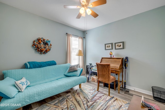 448 White Coral Ln, New Smyrna Beach, FL 32168 - living area with light wood finished floors and a ceiling fan