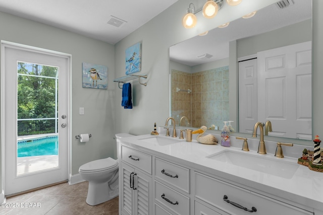 full bath featuring visible vents, a sink, and tile patterned floors