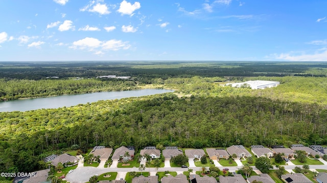 aerial view with a water view, a residential view, and a view of trees