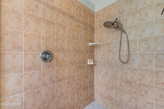 full bath with tiled shower