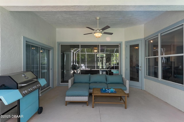 view of patio featuring an outdoor hangout area, grilling area, and a ceiling fan