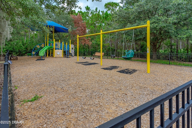 communal playground featuring fence