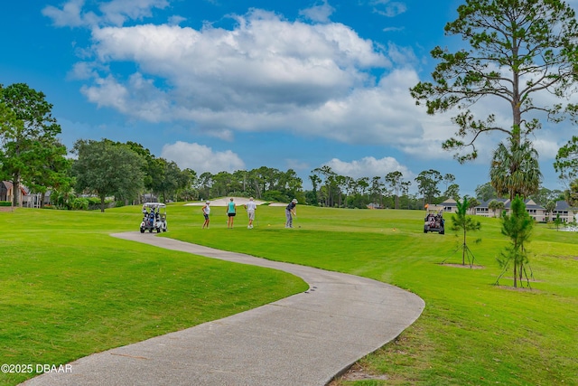 surrounding community with a yard