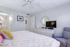 4175 S Atlantic Ave Unit 405, New Smyrna Beach, FL 32169 - bedroom with a ceiling fan