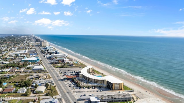 aerial view with a water view and a view of the beach