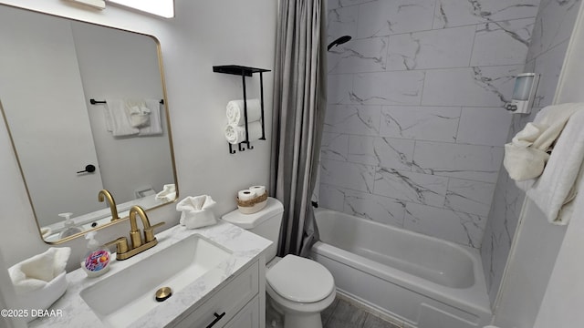 full bathroom with shower / bath combo with shower curtain, toilet, and vanity