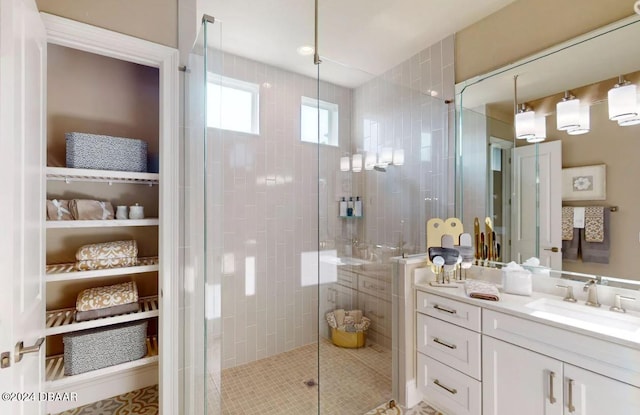 bathroom with vanity and an enclosed shower