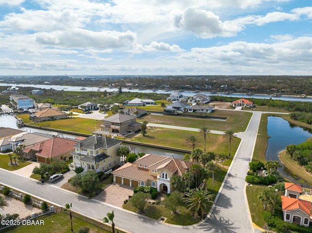 bird's eye view with a water view