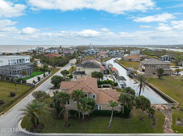 drone / aerial view featuring a water view