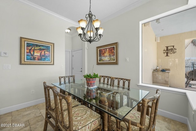 dining area featuring crown molding and a chandelier