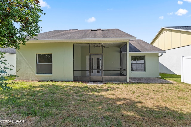 3864 Long Grove Ln, Port Orange, FL 32129 - rear view of house with french doors, a lawn, and ceiling fan