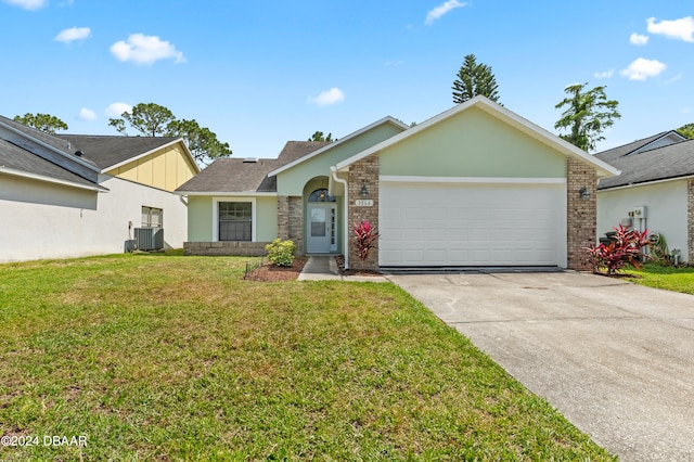 ranch-style home featuring a garage, a front yard, and central AC