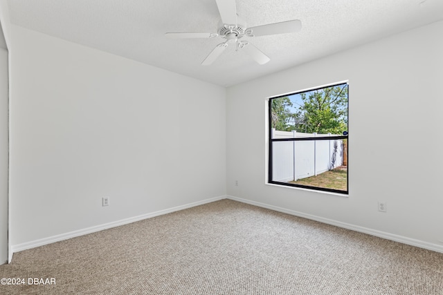 3864 Long Grove Ln, Port Orange, FL 32129 - carpeted empty room featuring a textured ceiling and ceiling fan