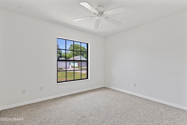 3864 Long Grove Ln, Port Orange, FL 32129 - carpeted empty room with a textured ceiling and ceiling fan
