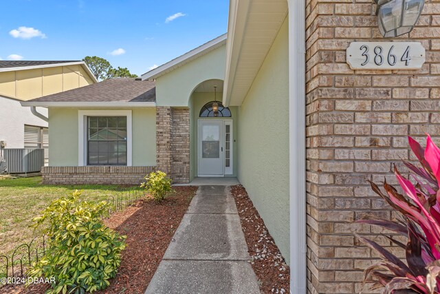 3864 Long Grove Ln, Port Orange, FL 32129 - view of exterior entry featuring cooling unit