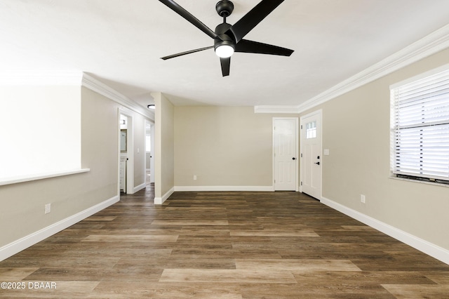 entryway featuring ceiling fan, crown molding, and dark hardwood / wood-style floors