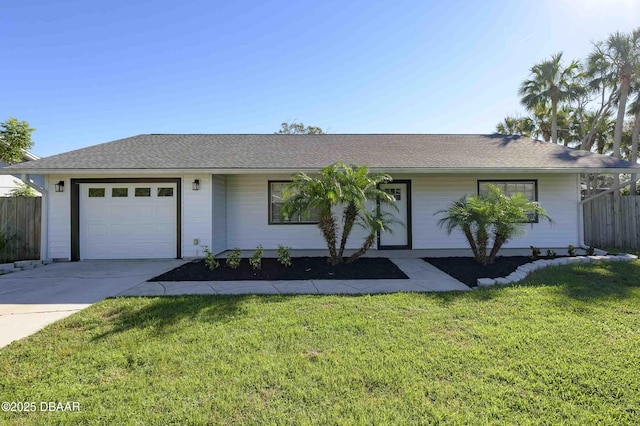 ranch-style house with a garage and a front lawn