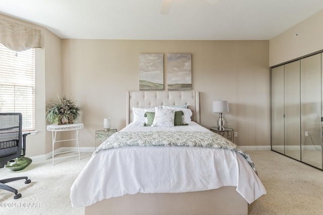 4672 Riverwalk Village Ct Unit 8203, Ponce Inlet, FL 32127 - bedroom with carpet flooring, baseboards, multiple windows, and a closet