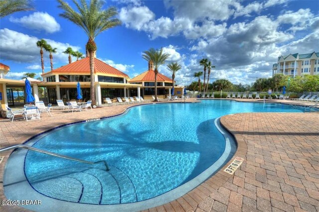 4672 Riverwalk Village Ct Unit 8203, Ponce Inlet, FL 32127 - community pool with a patio
