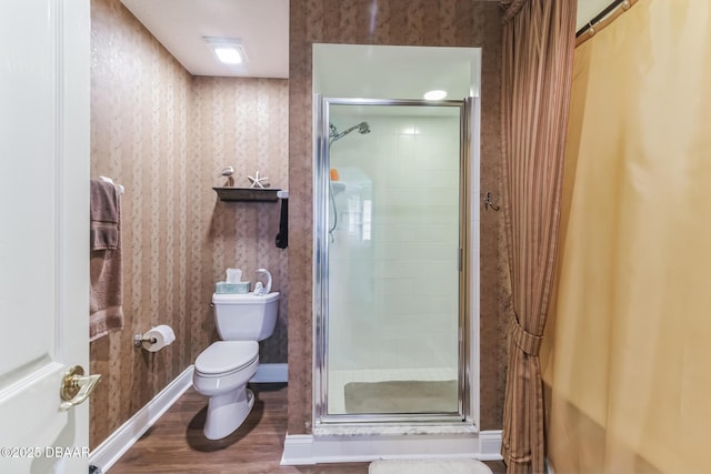 4672 Riverwalk Village Ct Unit 8203, Ponce Inlet, FL 32127 - full bathroom featuring baseboards, a stall shower, toilet, and wood finished floors