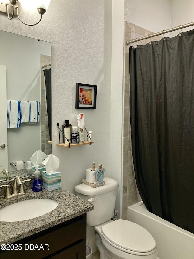 full bathroom featuring vanity, toilet, and shower / bath combo with shower curtain