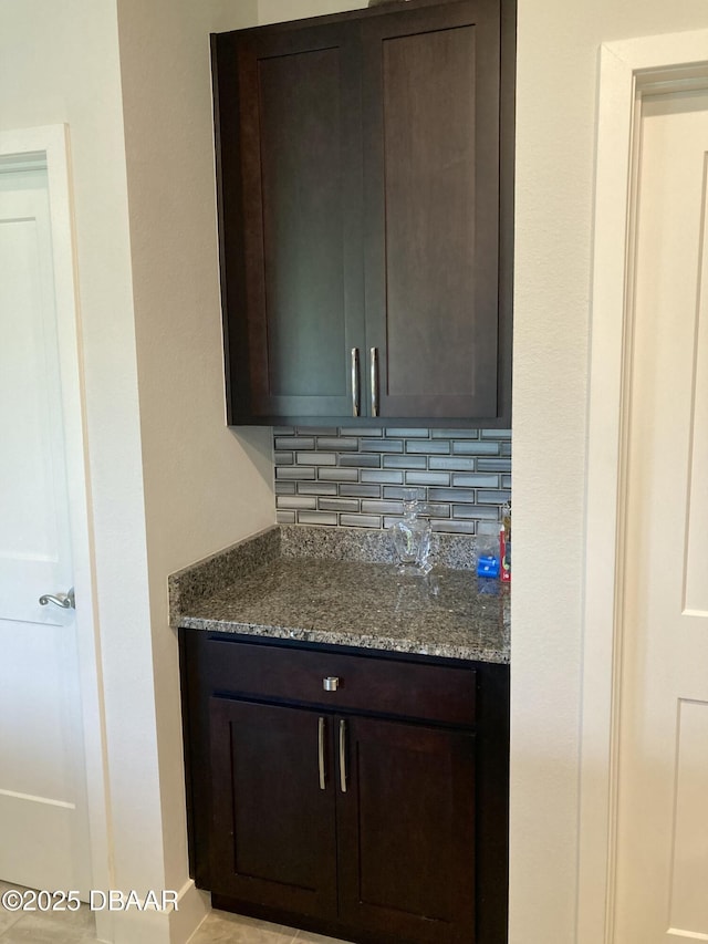 interior details featuring decorative backsplash