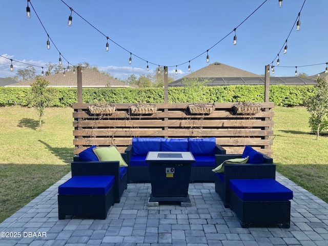 view of patio featuring fence and an outdoor hangout area