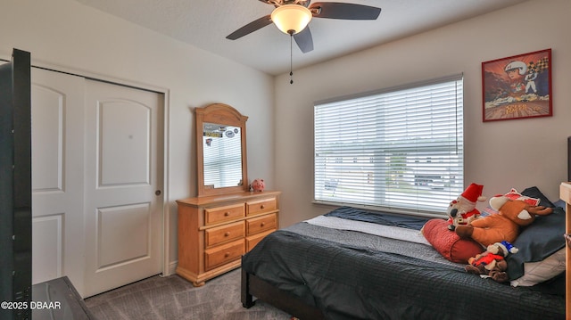 carpeted bedroom featuring ceiling fan