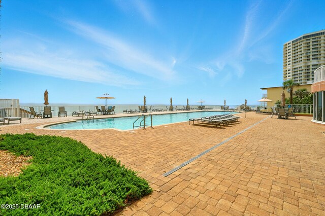 2515 S Atlantic Ave Unit 502, Daytona Beach, FL 32118 - community pool with a patio area