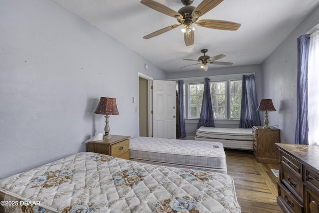 bedroom featuring ceiling fan and wood finished floors