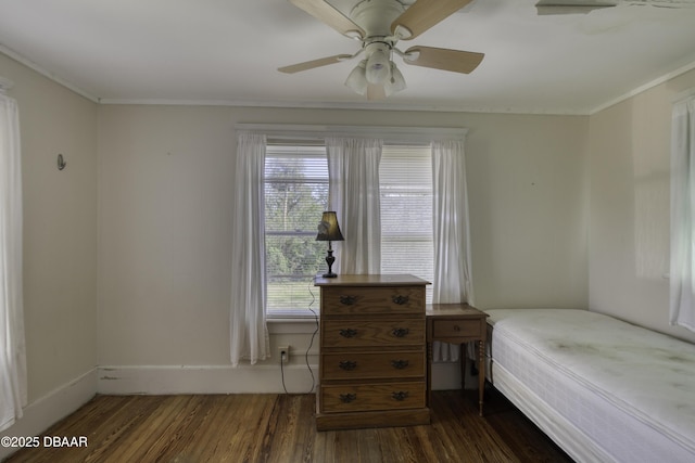 bedroom featuring baseboards, ornamental molding, ceiling fan, and dark wood-style floors