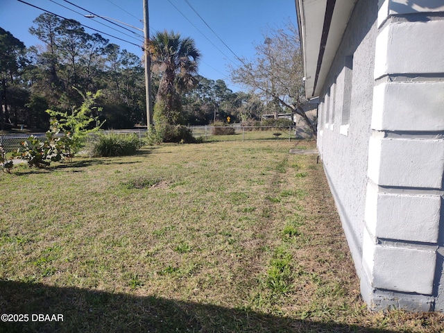 view of yard with fence