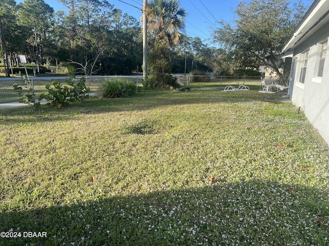 view of yard featuring fence