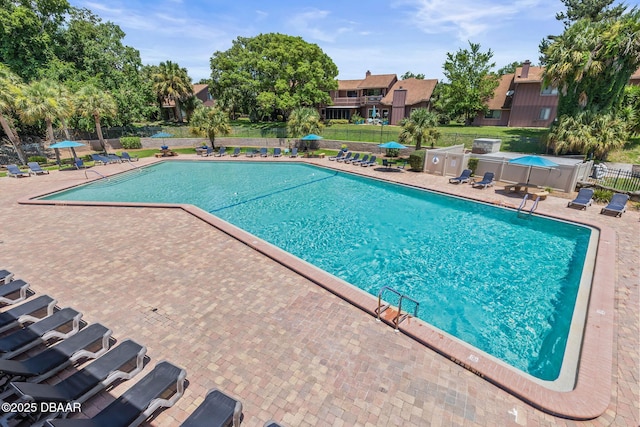 7 Appaloosa Trl, Ormond Beach, FL 32174 - community pool featuring a patio