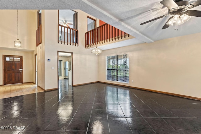 7 Appaloosa Trl, Ormond Beach, FL 32174 - unfurnished living room with a ceiling fan, tile patterned flooring, and baseboards