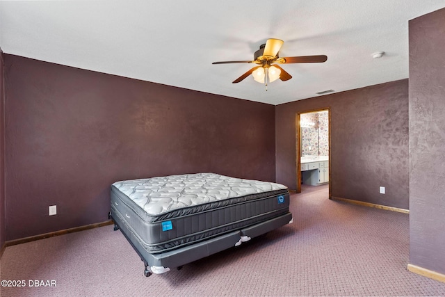 7 Appaloosa Trl, Ormond Beach, FL 32174 - bedroom with carpet, baseboards, ceiling fan, and ensuite bath