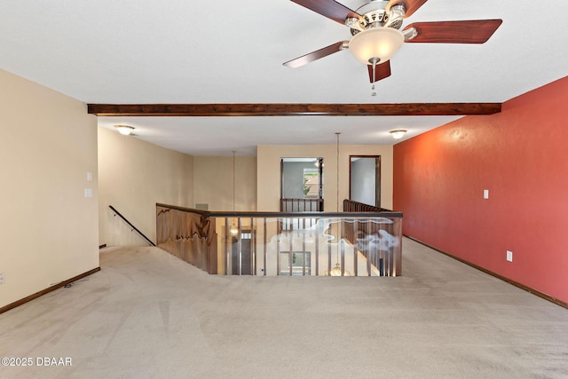 7 Appaloosa Trl, Ormond Beach, FL 32174 - spare room featuring carpet, beam ceiling, baseboards, and a ceiling fan