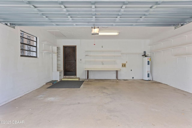7 Appaloosa Trl, Ormond Beach, FL 32174 - garage with a garage door opener and water heater