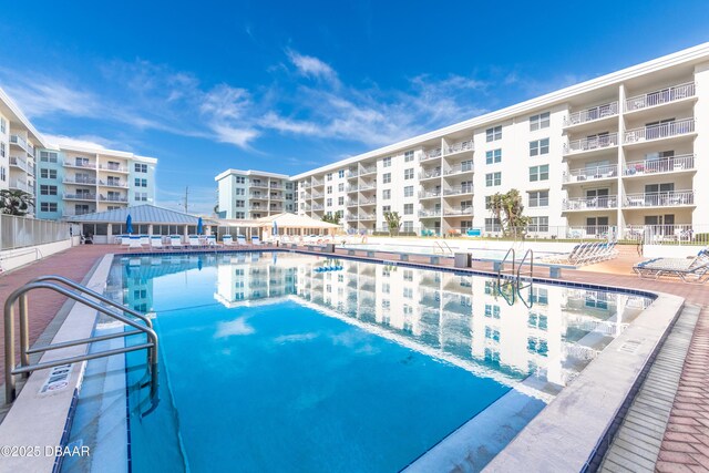 view of pool featuring a patio