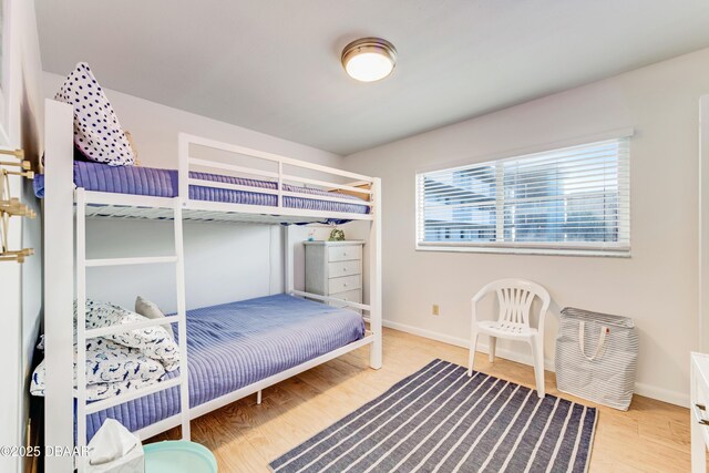 bedroom with hardwood / wood-style floors